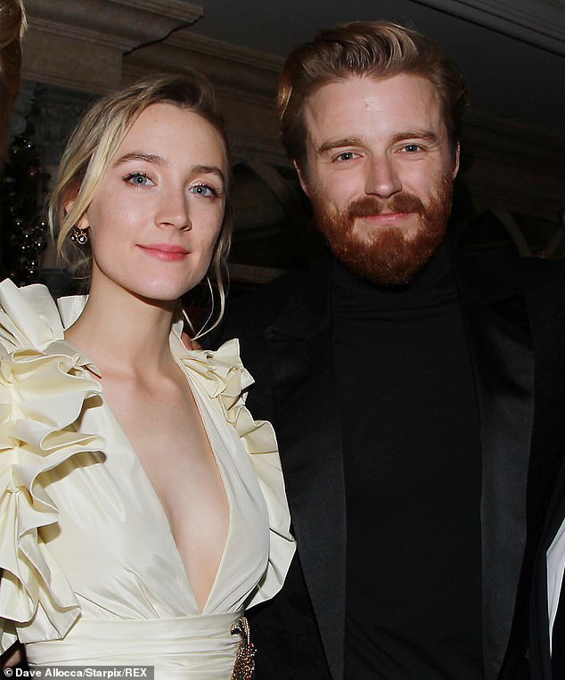 It must be love: Saoirse Ronan and Jack Lowden have reportedly struck up a romance after falling for another on set of their film Mary Queen Of Scots