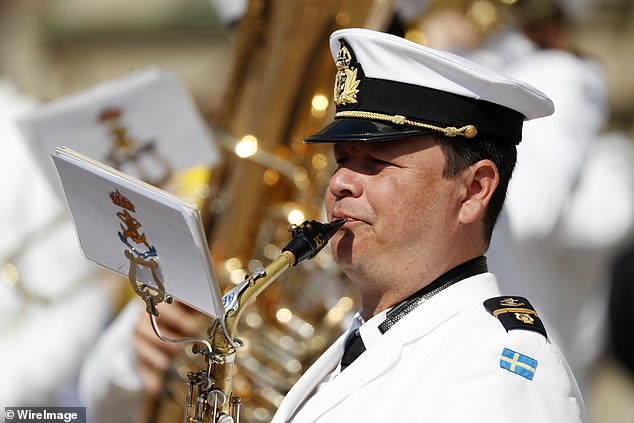 One musician looked focused as he prepared to perform for the royal family on Sweden