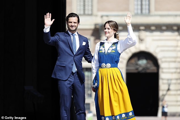 The couple beamed as they waved to crowds who had gathered at the Royal Palace in the country