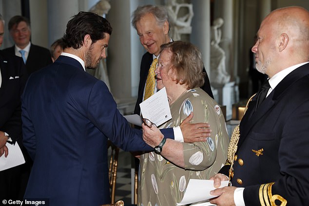 He congratulated the winners at the event, and was seen chatting to those who had taken part inside the palace