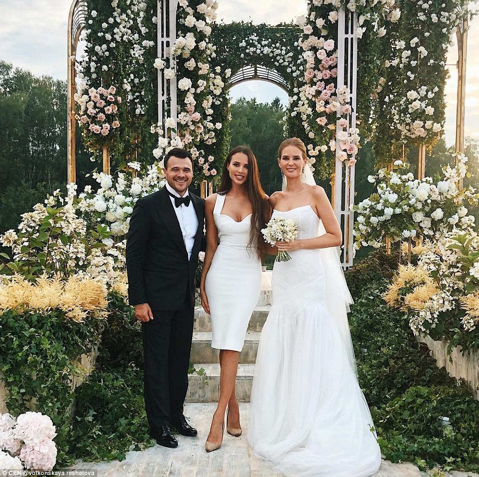According to reports, the happy couple tied the knot at sunset in the company of around 200 guests. Pictured: The newlyweds with Russian model Anastasia Reshetova 