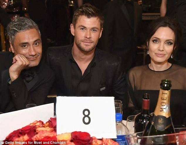 Lookalike: Golden Globe viewers did a double take when Angelina Jolie was seated next to Chris in the audience, comparing the Thor star to the actress