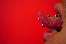 Jacklyn Tongue by Tommy T Body piercing.jpg
