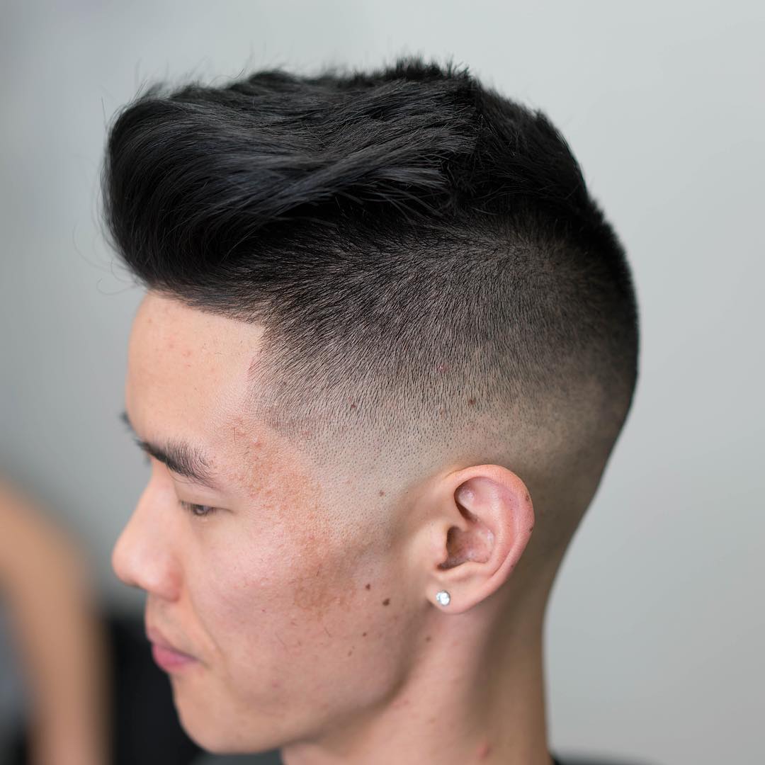 messy pompadour with shaved sides