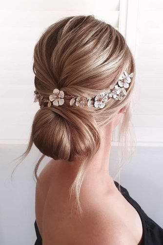 wedding hairstyles for medium hair low chignon with gold flower halo cathughesxo